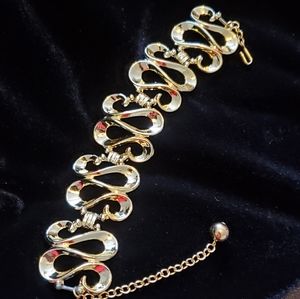 Goldtone S link adjustable wide bracelet